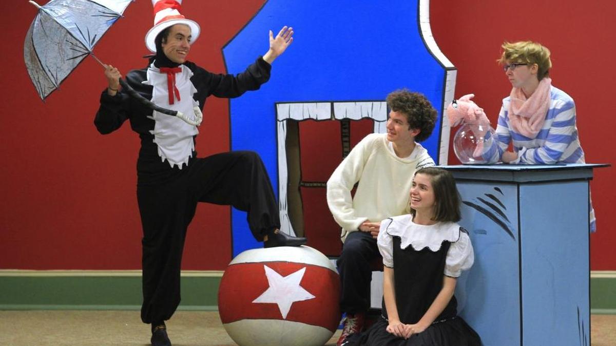From left, Jasper Howell (Cat), Ryan Drew (Boy), Anna Katherine Drew (Sally) and Reed Cardwell (Fish) rehearse recently for the upcoming production of "Cat in the Hat" at the Springer Opera House.