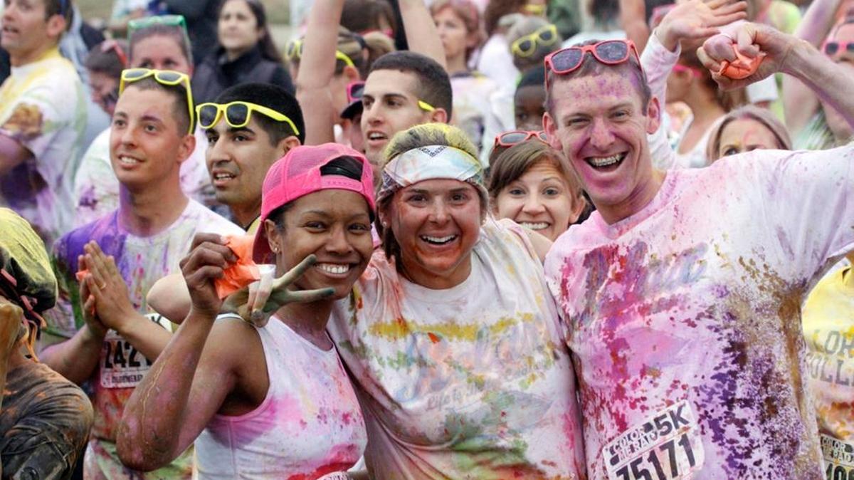 Color Me RAD runners hang out at Woodruff Park for the big color-bombs party at Woodruff Park.