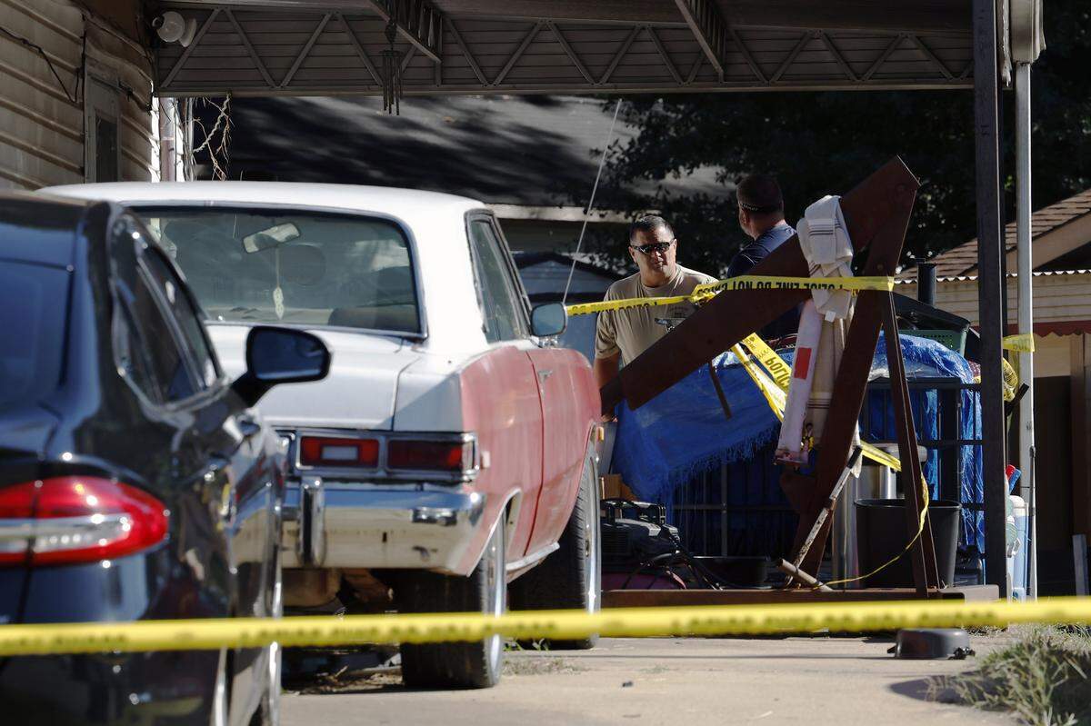 Law enforcement officers are at 915 Wehring Lane in Phenix City the morning of Oct. 14, 2025, after four members of a family died in a house fire the previous night, according to Russell County Coroner Arthur Sumbry Jr. The cause of death is due to “possible smoke inhalation,” Sumbry said., and the cause of the fire is under investigation.