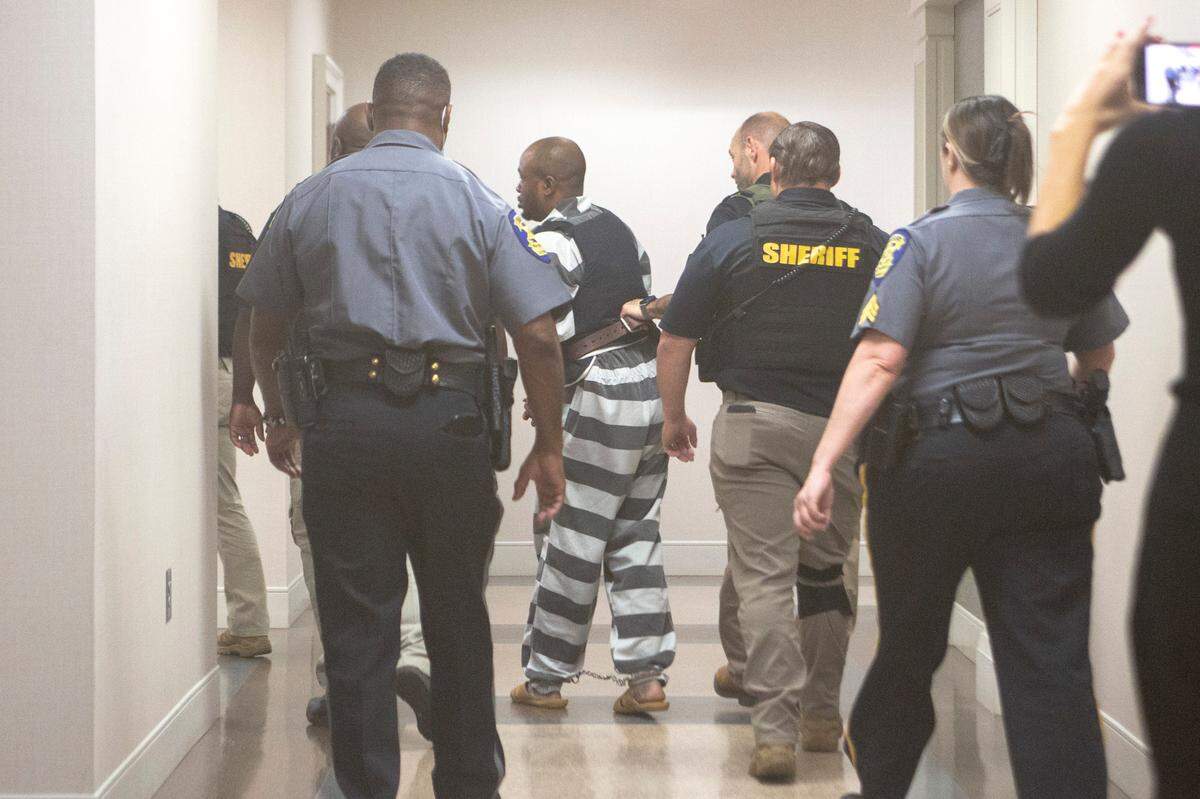 Jeremy Tremaine Williams leaves a Russell County courtroom after being charged with capital murder in Phenix City, Ala. on Dec. 14, 2021.