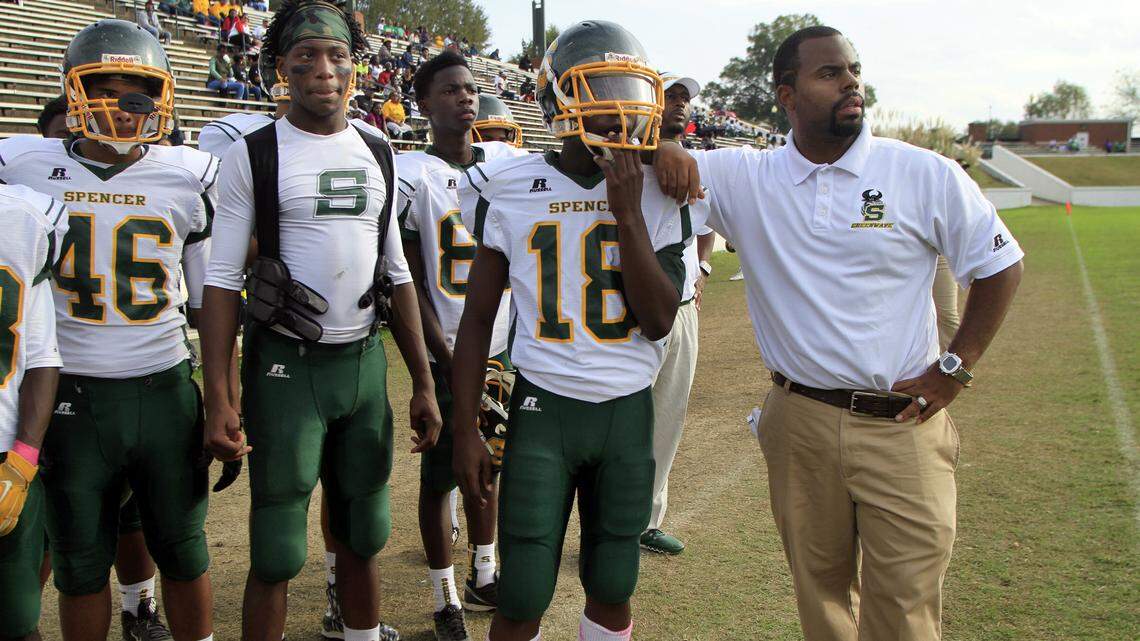 Spencer High head coach Pierre Coffey watches the field as the clock winds down against Kendrick on Saturday, October 31, 2015 at Memorial Stadium. Coffey is leaving the Greenwave after three seasons as head coach