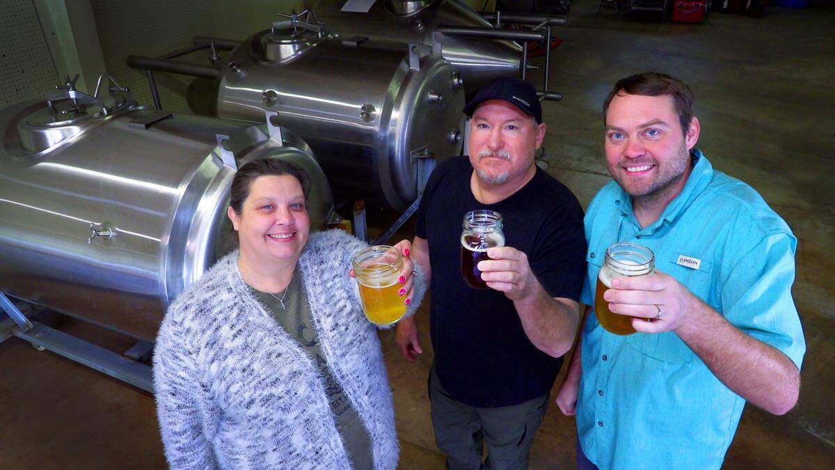 Fluid Dynamics is the product of three entrepreneurs: ​brewmasters Justin Balsam, right, and Dee Moore, center, and Heather Manville, a partner in the upcoming ​business.