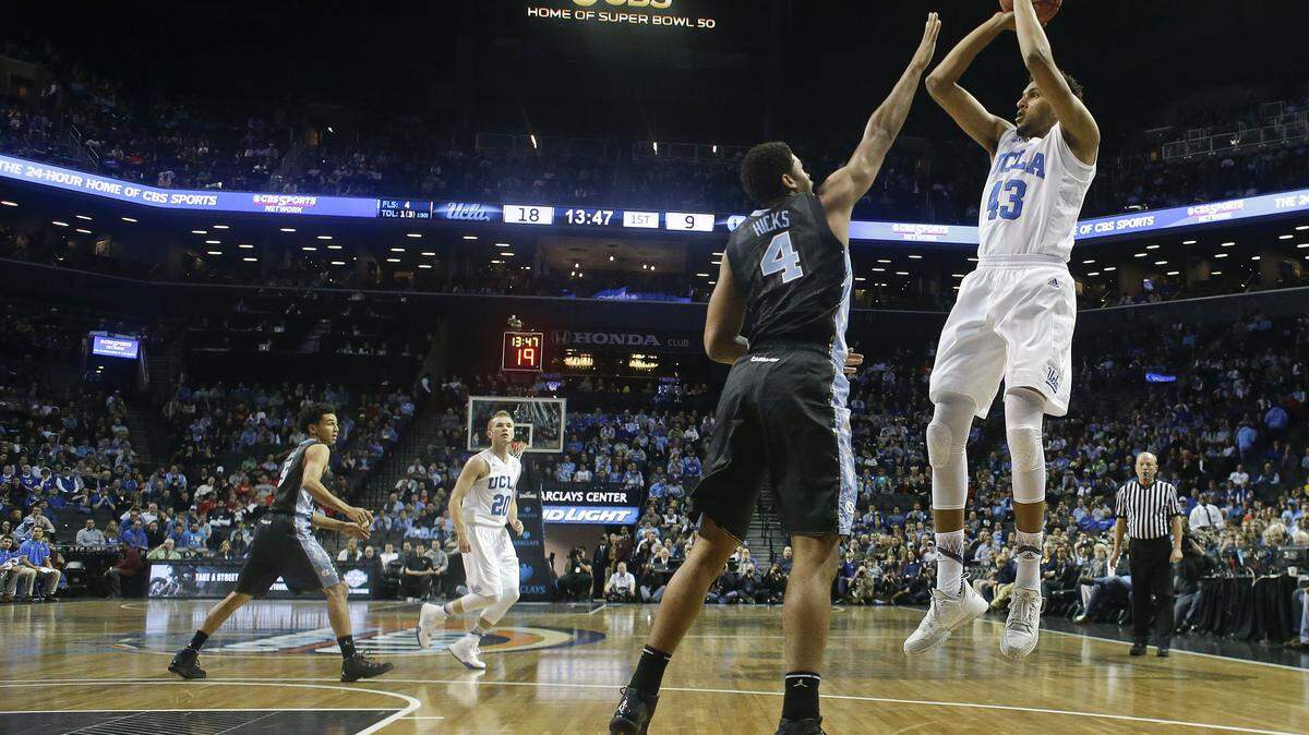 FRANK FRANKLIN II/Associated PressUCLA's Jonah Bolden (43) shoots over North Carolina's Isaiah Hicks (4) during the first half of an NCAA college basketball game Dec. 19 in New York.