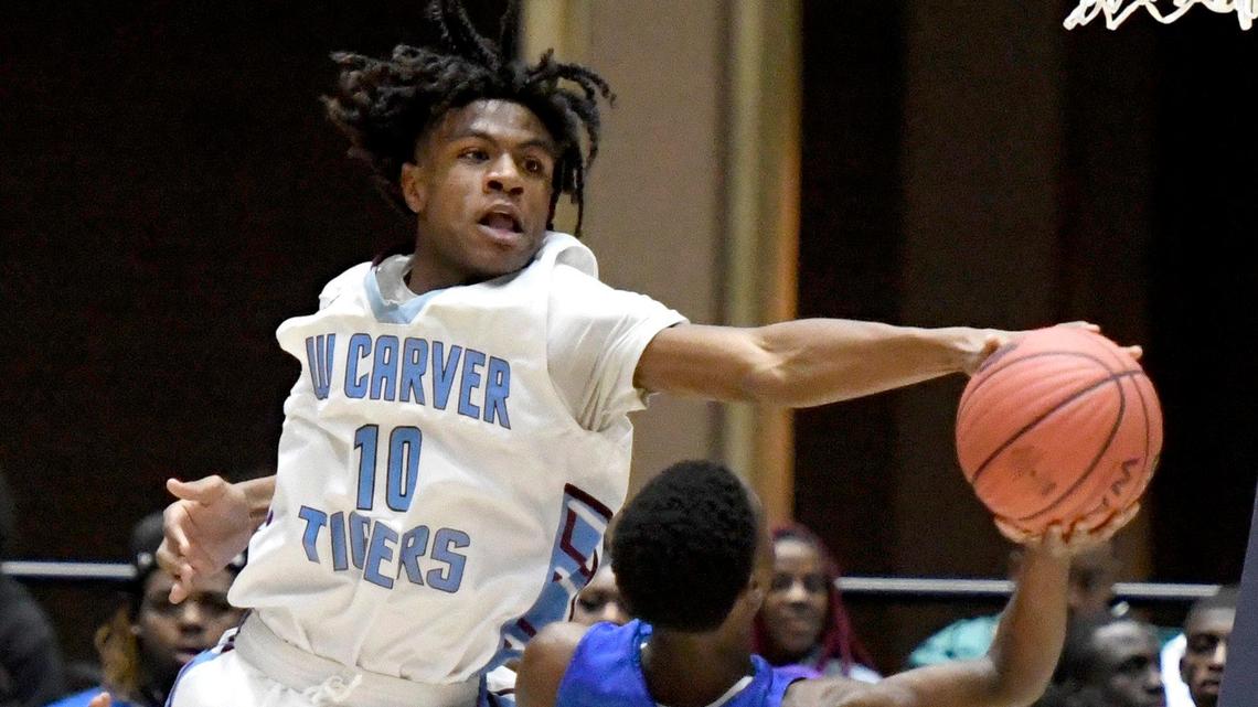 ‘They rely on me a lot.’ This Carver star is a quiet force on the court and the gridiron