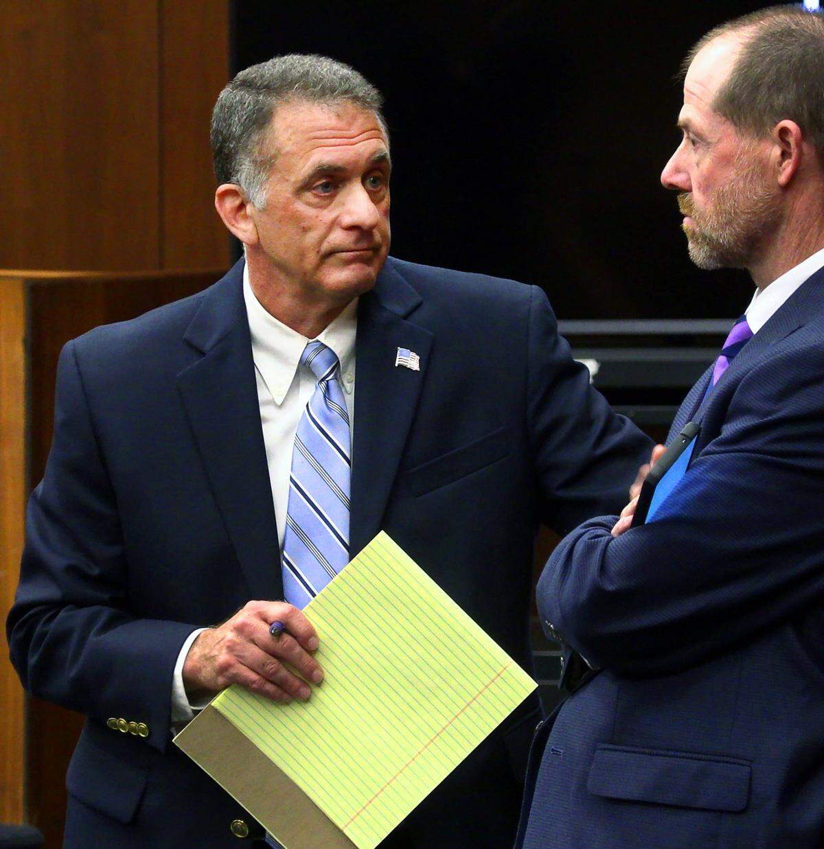 Assistant District Attorney Peter Hoffman, left, speaks with Jeff Carter, an investigator with the District Attorney’s office, Thursday morning prior to court beginning for the day. 06/16/2022