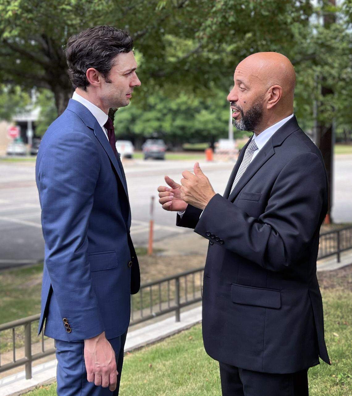 Columbus Councilor Bruce Huff of District 3, right, speaks with U.S. Sen. Jon Ossoff, D-Georgia, on Aug. 20, 2025, in Columbus, where Ossoff hosted a news conference to announce President Donald Trump signed into law bipartisan legislation that Ossoff championed to help veterans experiencing financial hardship avoid foreclosure.