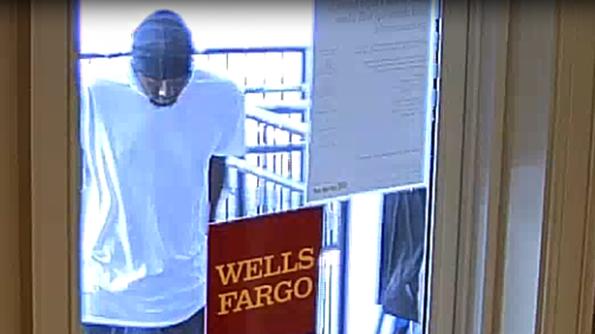 This photo shows the robber before entering Wells Fargo bank on July 7 at 1000 18th St. in Columbus. \