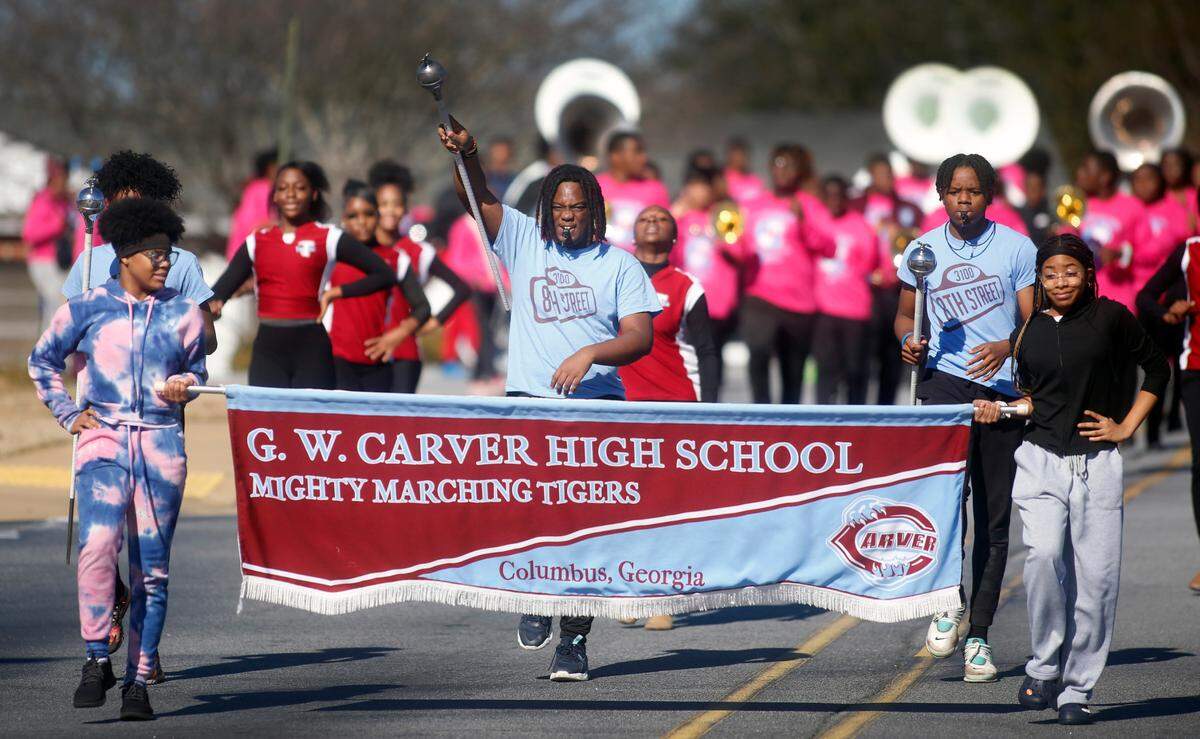 Members of the G.W. Carver High School Mighty Marching Tigers from Columbus, Georgia rehearse Thursday afternoon for their participation in the upcoming Peach Bowl Parade in Atlanta, Georgia. 12/29/2022