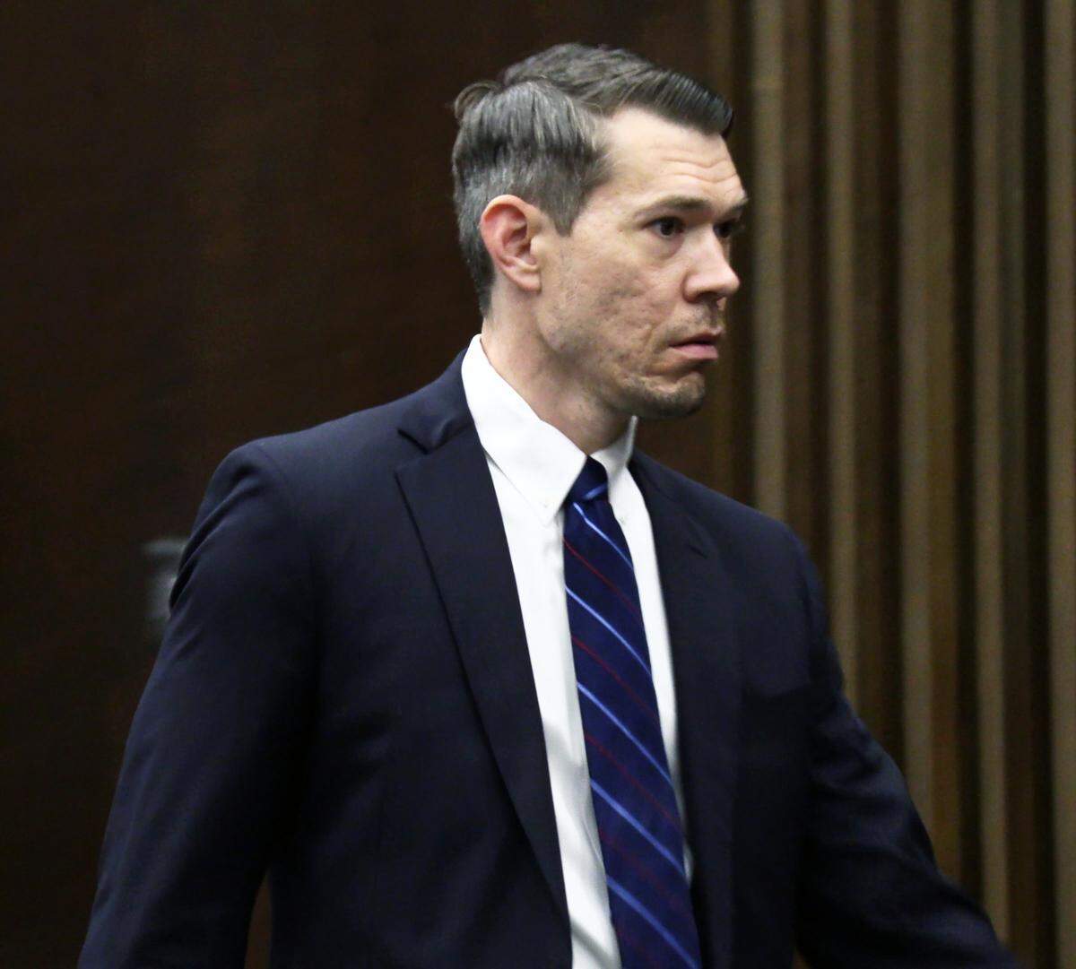 Suspended Chattahoochee Judicial Circuit District Attorney Mark Jones leaves court Oct. 12, 2021 after his formal arraignment in the alleged misconduct case against him.