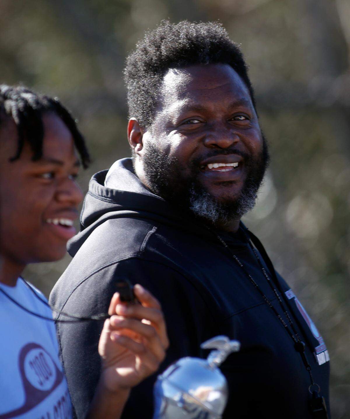 Lorenzo Manuel, right, band director at G.W. Carver High School in Columbus, Georgia, rehearses the band Thursday afternoon in advance of their upcoming participation in the Peach Bowl Parade in Atlanta, Georgia. 12/29/2022