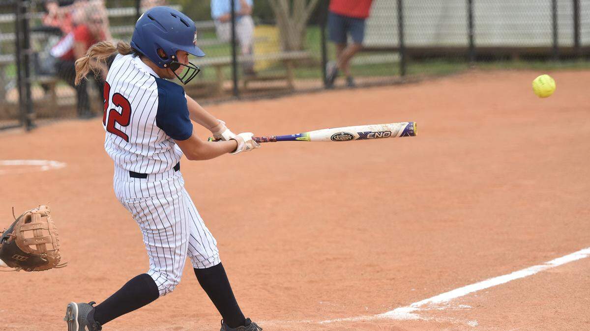 Northside’s Madison Cosgrove connects for a base hit in the third inning of Game 1 against Woodard Academy in the first round of the Georgia Class AAAA state playoffs Tuesday, October 9, 2018.