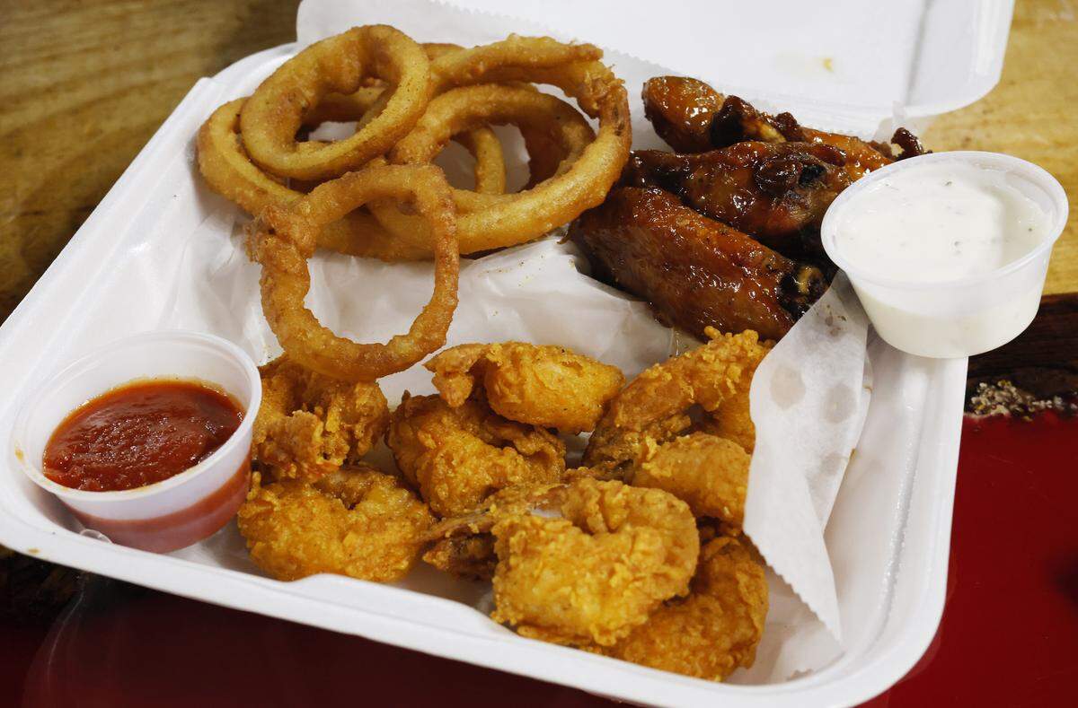 The Ledger-Enquirer last week posted an online poll in the Extra Access channel on our Facebook page to see which place reporter and resident foodie Kelby Hutchison should review next. Readers chose Bmoski’s Flavor Wings & Cafe in Columbus, so Kelby and colleague Mike Haskey checked it out Aug. 18, 2025. Kelby ordered the wings and shrimp platter. It came with fried shrimp, six wings of your choice and a side. He chose fried onion rings.