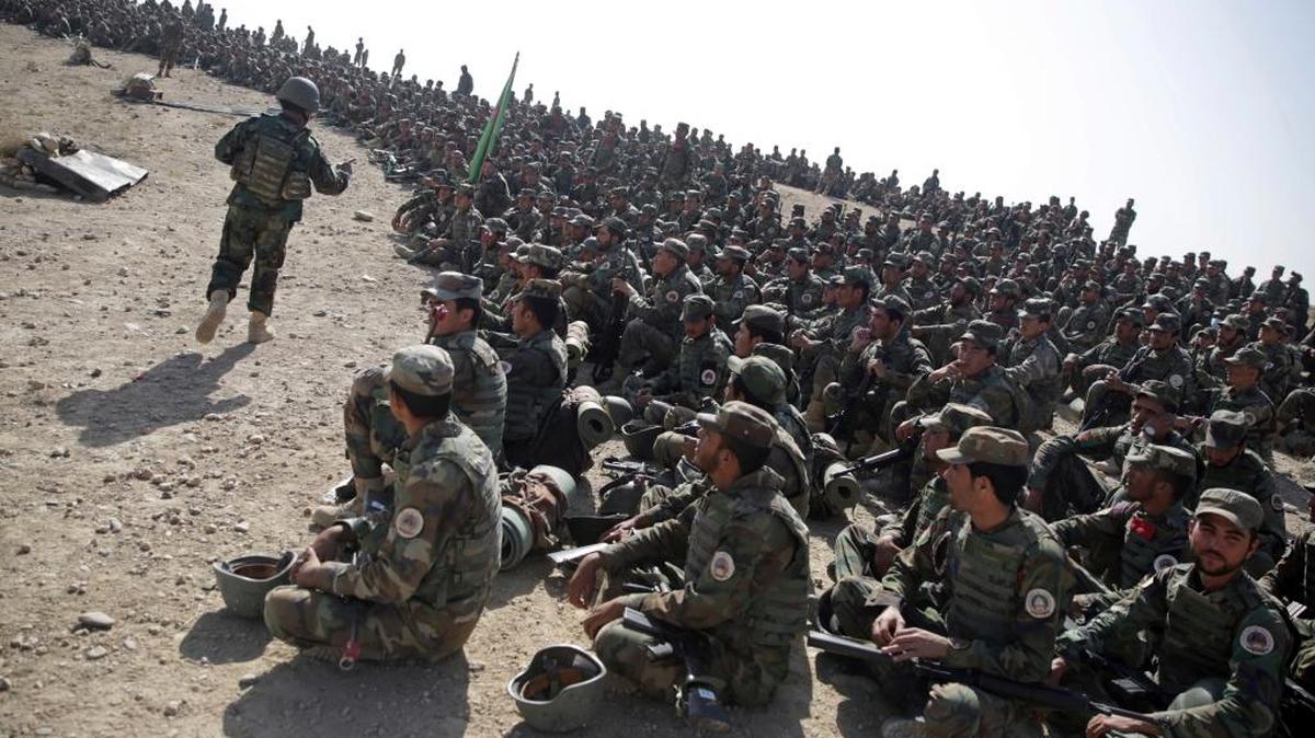 Afghan National Army soldiers sit during a military exercise on Oct. 17 in Kabul, Afghanistan. At least 152 Afghans sent to the United States for military training during the course of the war against the Taliban have gone AWOL.