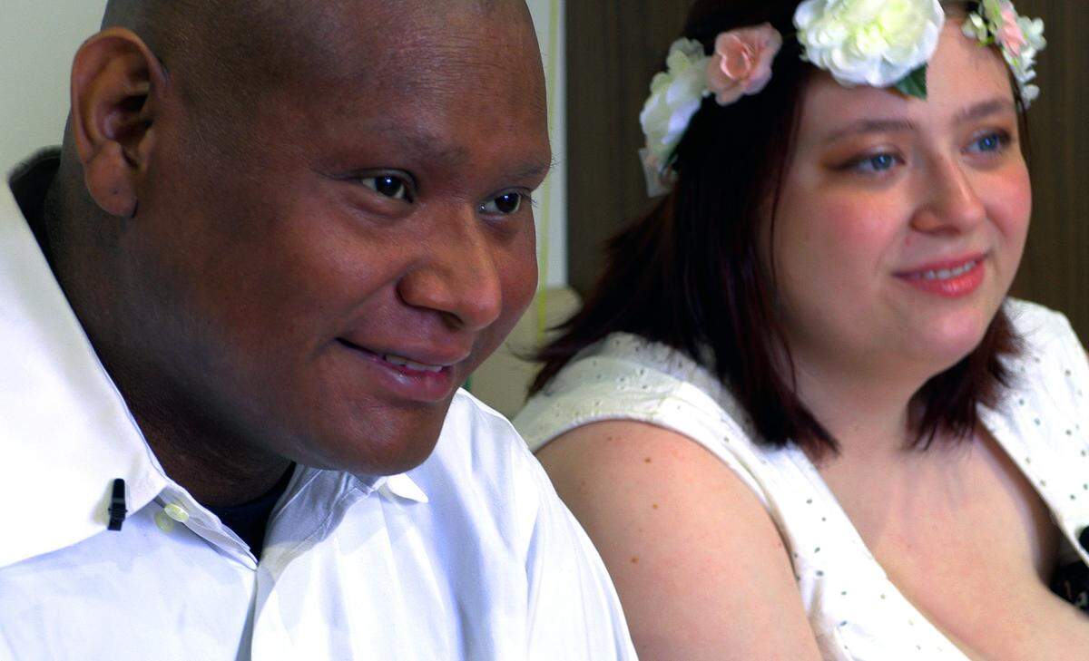 Alexander Ramirez Santos, left, married his fiancé Heather Renee Duke in his hospital room at Piedmont Columbus Regional’s Midtown Campus Wednesday afternoon. Pastor Marlon Scott officiated the ceremony. 07/20/2023