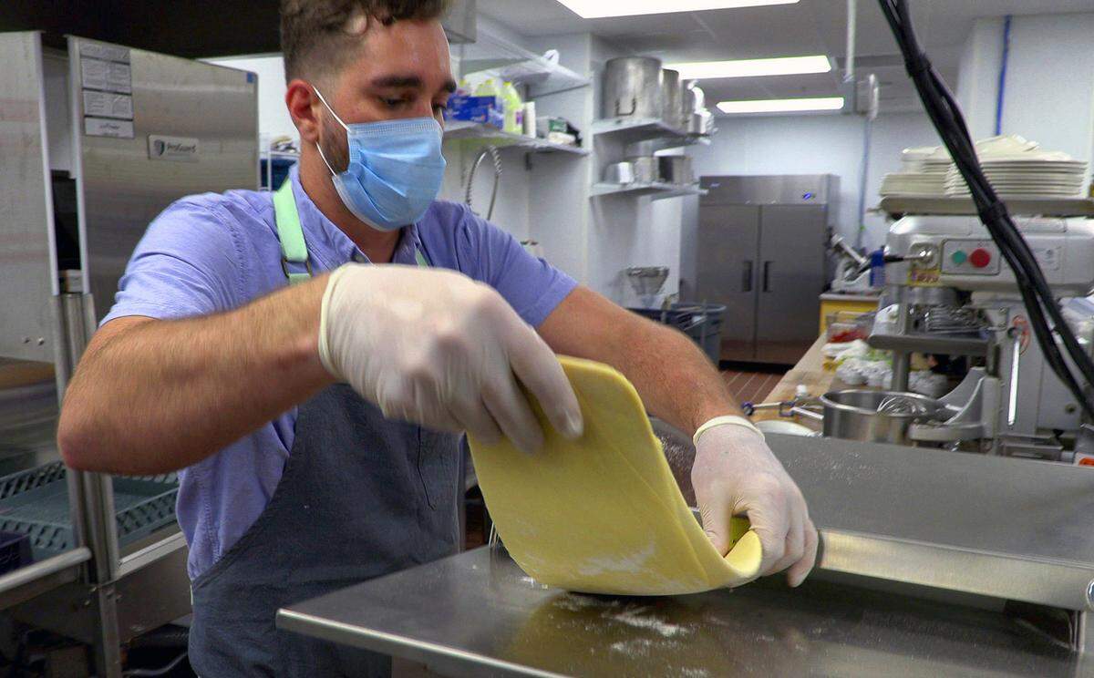 Chef James Jolly prepares fresh pasta recently at Trevioli at The Rapids in downtown Columbus, Georgia. After a six month delay, Trevioli at The Rapids is finally ready to open its doors on the ground floor of a $52 million luxury apartment building along the Chattahoochee River. Co-owners Trevor Morris and Sanjay Choudhury are planning a grand opening for 5 p.m. Wednesday, where guests will be able to visit the newly completed (and socially distanced) dining room, taste the menu and hear live music at the adjacent Mat Swift Park.