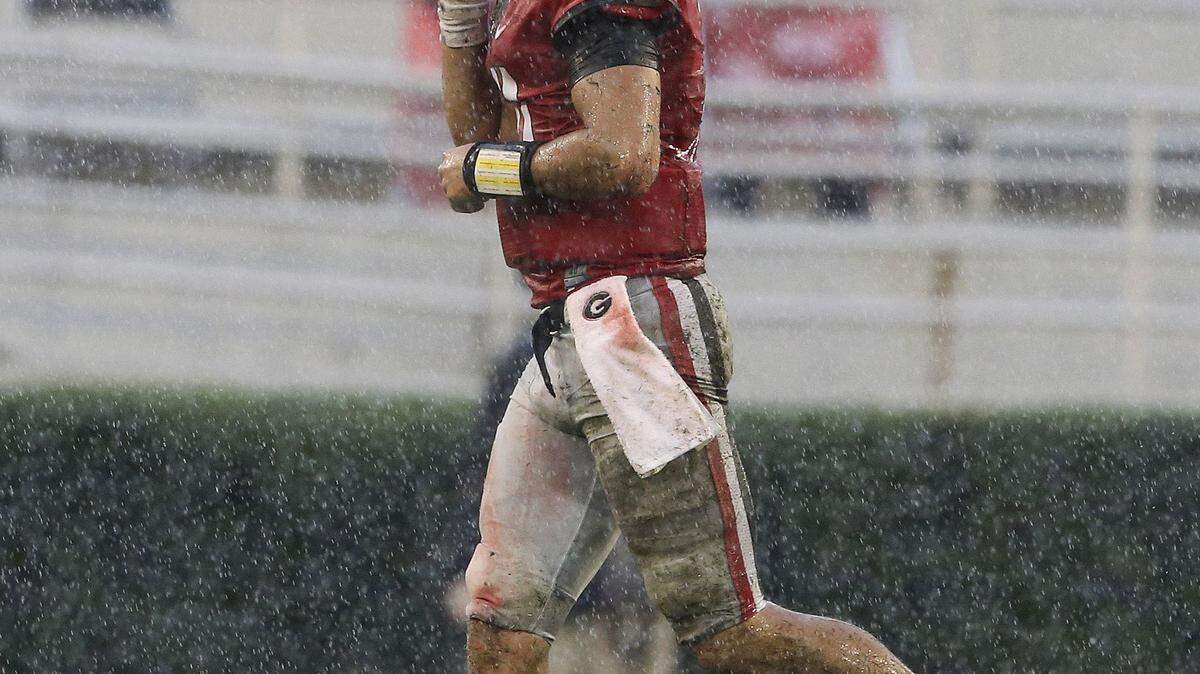 JOHN BAZEMORE/Associated PressGeorgia quarterback Greyson Lambert (11) trots off the field after a fumble against Alabama, Saturday in Athens.