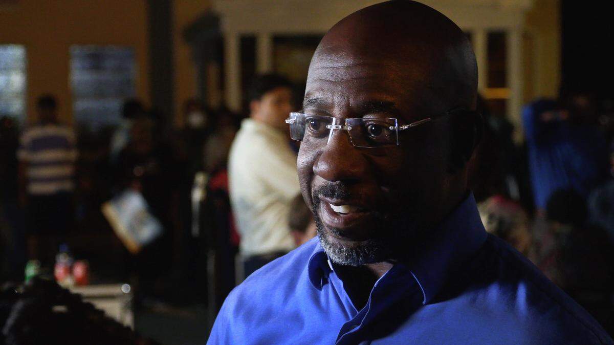 U.S. Senator Raphael Warnock campaigns Monday night at Abundant Life Full Gospel Outreach Church in Columbus, Georgia. 11/07/2022