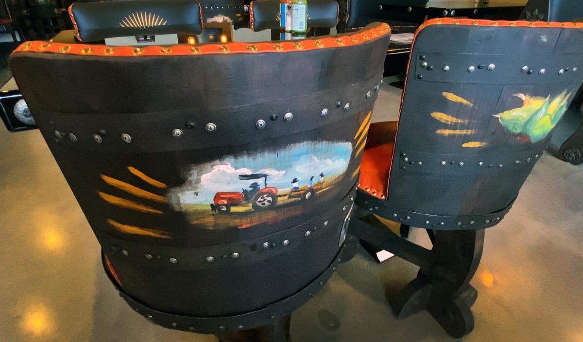 The furniture at La Huerta was imported from Mexico. On the back of each chair there’s a different image representing the country that was hand painted. 02/09/2023