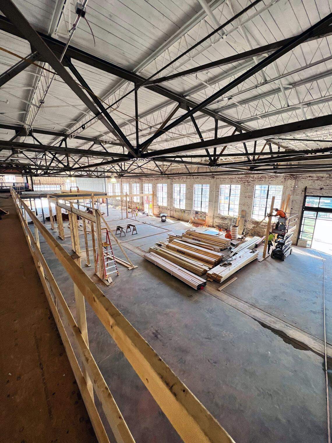 Workers build out the Highside Market in Columbus, Georgia.