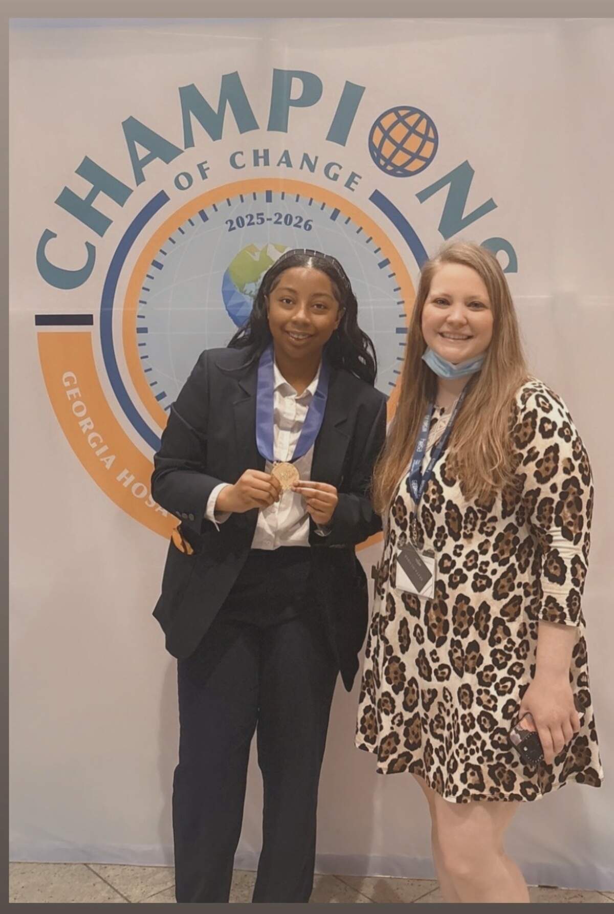 Spencer High School senior Emaureia Mathis of Columbus poses with Bethany Collins, chairwoman of the Career, Technical and Agricultural Education department at Spencer, after winning the speaking skills competition during the 2026 Georgia Health Occupations Students of America State Leadership Conference at the Atlanta Marriott Marquis.