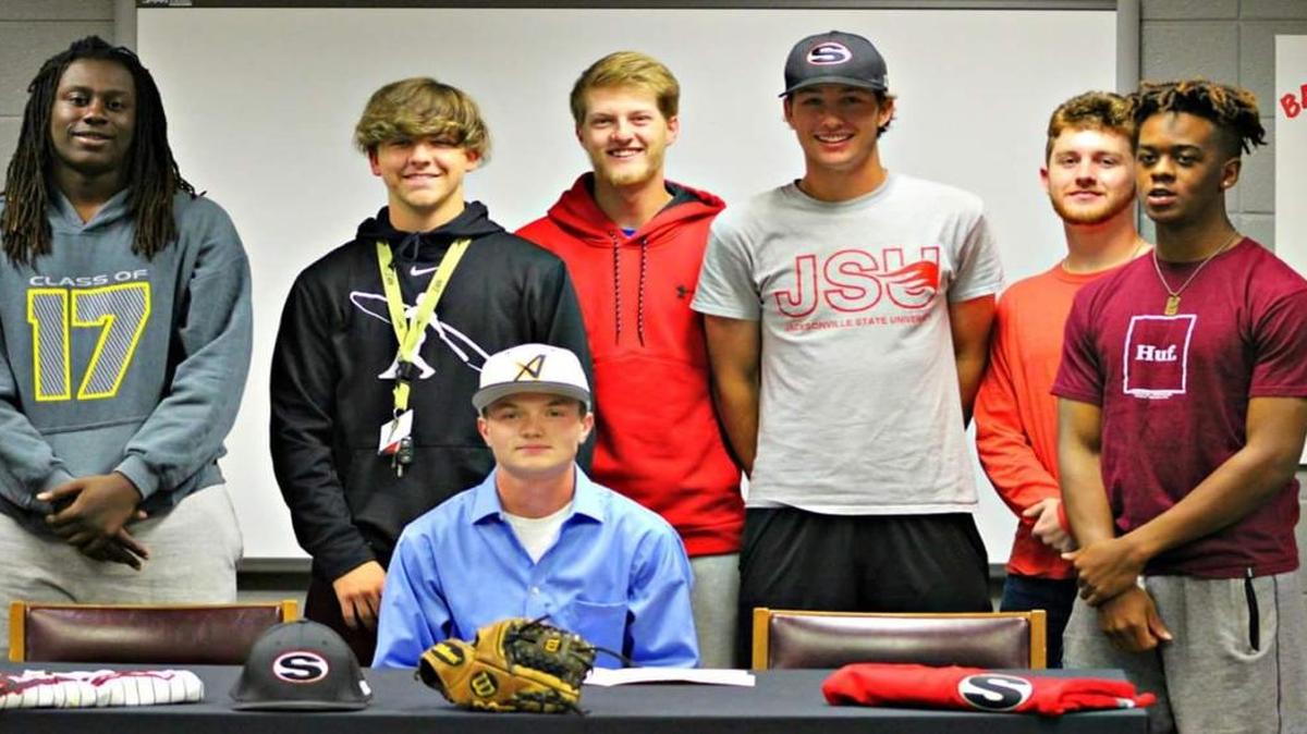 Shaw senior Bubba Pearson (seated) will continue his playing days at Andrew College.