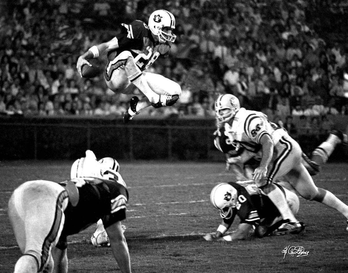 Herb Cawthorne won the Alabama Associated Press Class A Best Sports Photo of 1972. He was then a freelancer with the Opelika-Auburn News and won for this image of Auburn defensive back David Langner’s interception return against LSU.