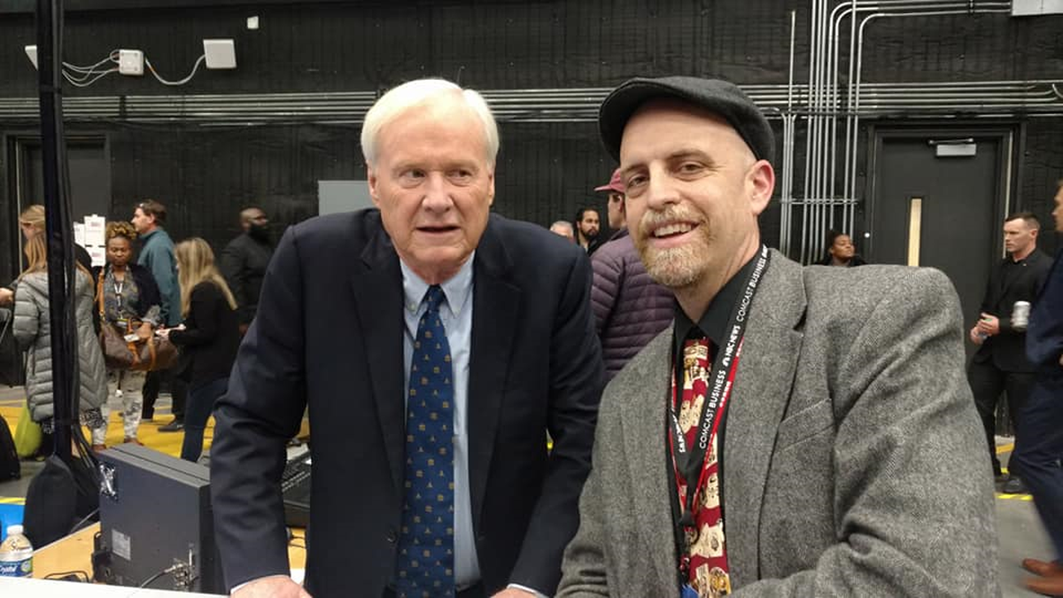 John A. Tures poses for a photo with MSNBC political commentator Chris Matthews at the Democratic Party presidential debate Wednesday night in Atlanta.