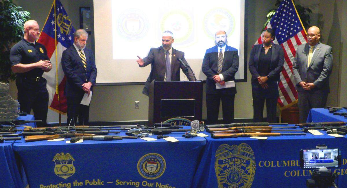 Deputy Chief Lance H. Deaton, center, of the Columbus Police Department speaks during a Feb. 27, 2025, press conference announcing the results of Operation D.I.R.E.C.T. Pressure. The operation was a partnership between the CPD, Bureau of Alcohol, Tobacco, Firearms and Explosives, the District Attorney’s office for the Chattahoochee Judicial Circuit and the U.S. Attorney’s Office for the Middle District of Georgia. 02/27/2025
