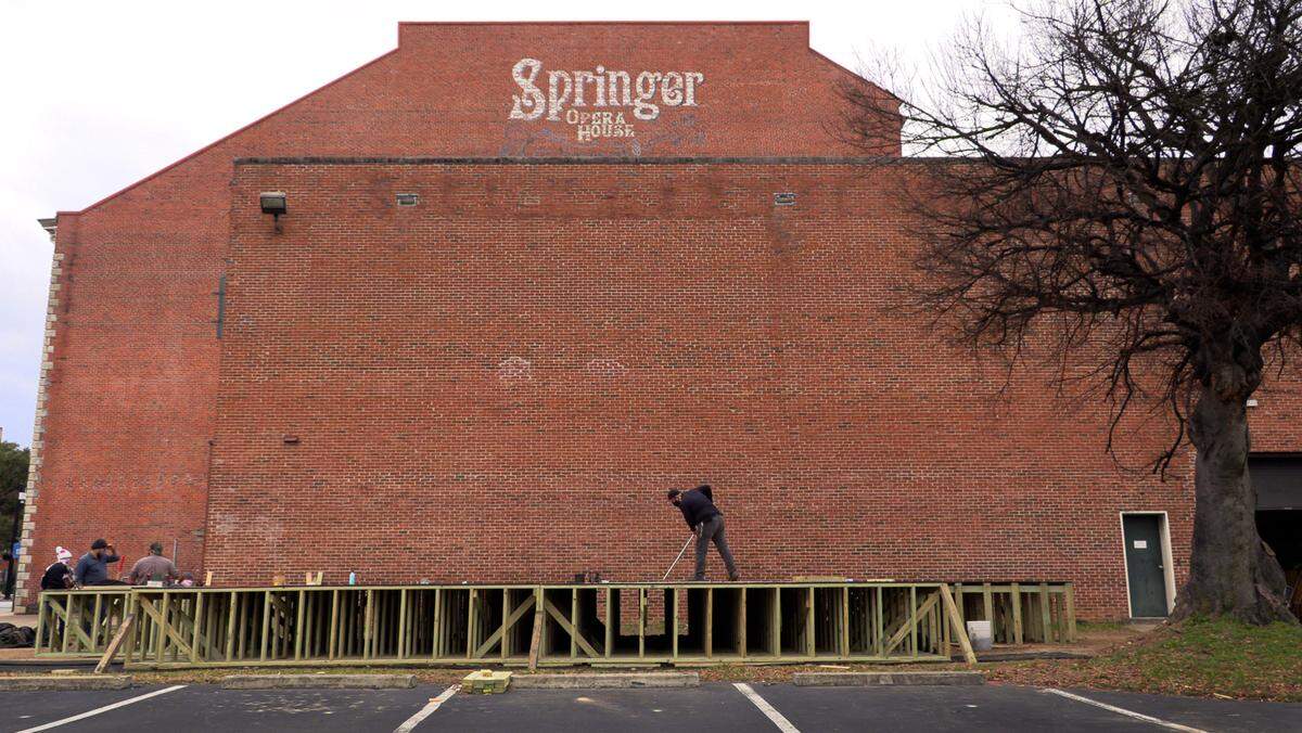 As the Springer Opera House prepares to celebrate its 150th birthday on Feb. 21, the theater’s staffers have begun building a new outdoor performance space to keep shows going as the COVID-19 pandemic continues. The new amphitheater is under construction in the Springer’s parking lot at the corner of 10th Street and Second Avenue, said Paul Pierce, the Springer’s producing artistic director.