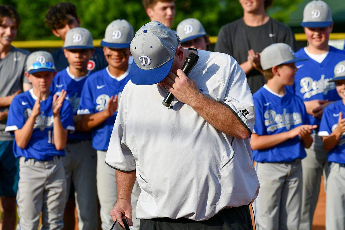 Randy Morris tries to gather his thoughts after being asked to speak at a ceremony Wednesday night at Northern Little League in honor of his retirement. 04/28/2021