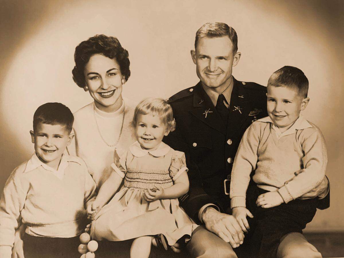 A family photo of Julie and Hal Moore with their children Greg, Steve, and Julie.