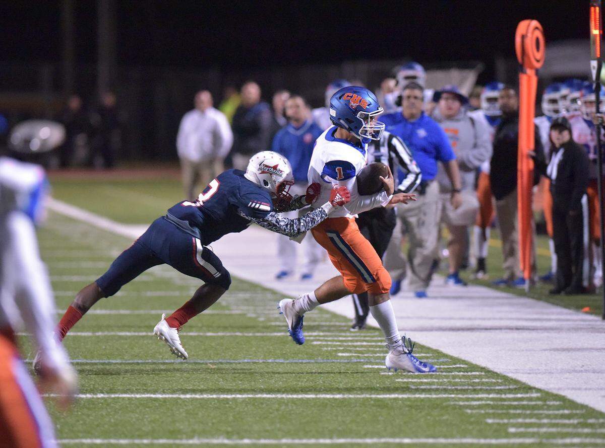 Northside’ Jerry Adams forces Columbus’ Donovan Carter to the sideline in the first quarter of Friday night’s game at Kinnett Stadium on November 2, 2018.