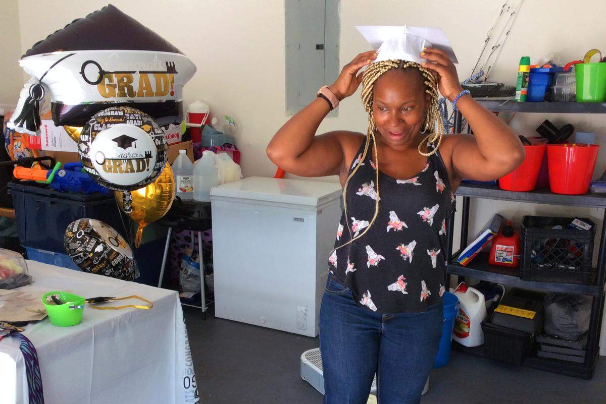 Chavala Burse celebrated her graduation from Columbus State University with a small party at her home in Hamilton, Georgia on Thursday May 21, 2020.