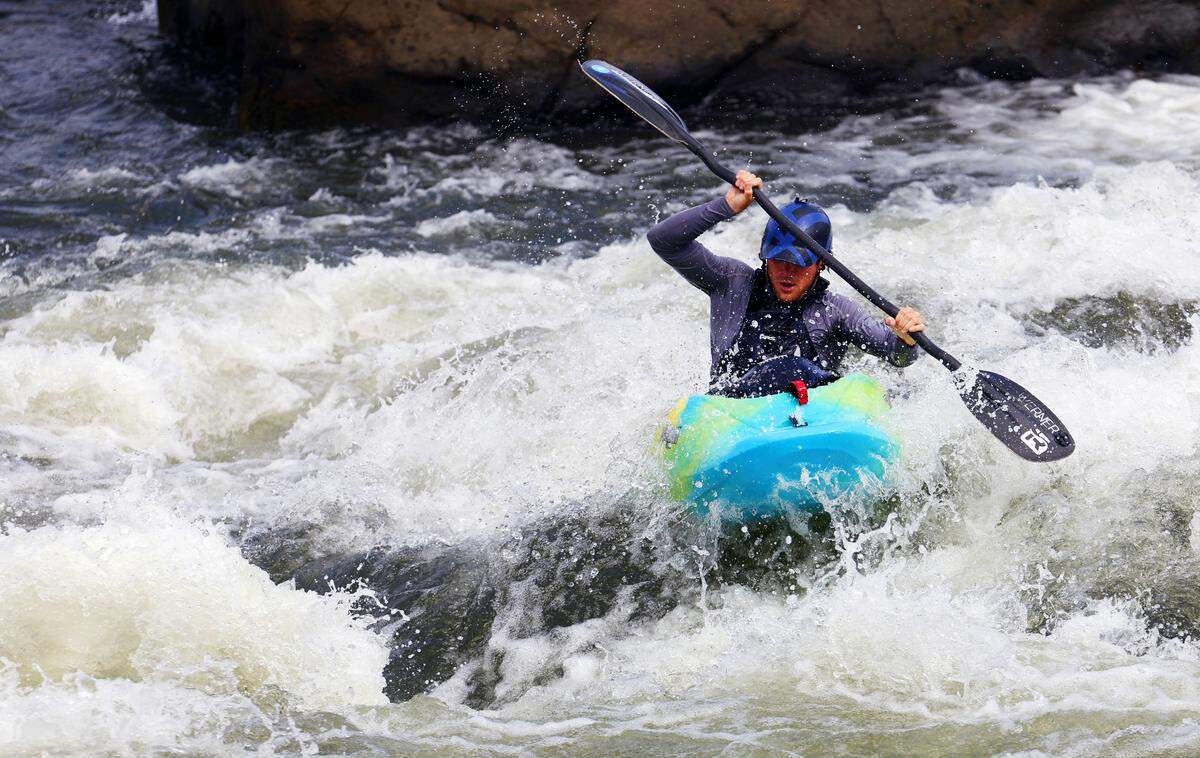 Mason Hargrove, a world freestyle kayaking champion,, demonstrates freestyle kaying after a July 30, 2025 press conference announcing Columbus, Georgia has been selected by the International Canoe Federation (ICF) to host both the 2028 ICF Canoe Freestyle World Cup and the 2029 ICF Canoe Freestyle World Championship events. 07/30/2025