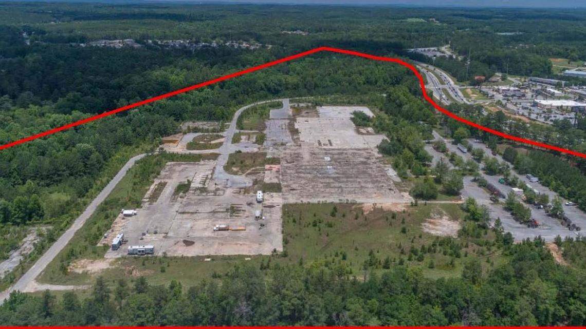 This aerial photo shows the boundaries of the 86-acre property being developed into Midland Commons in north Columbus. The concrete that was the remains of a former Swift Textiles mill called the Boland Plant is being removed, as well as trees and vegetation, as the project moves forward. --
