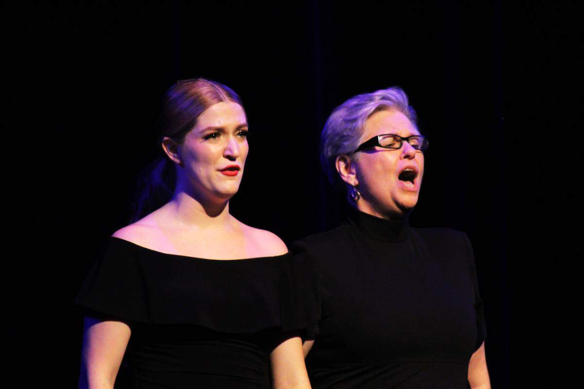 Debbie Anderson, right, and Courtlyn Holt perform at the annual TEACHaret production benefiting the Springer Academy at the Springer Opera House in Columbus, Georgia.