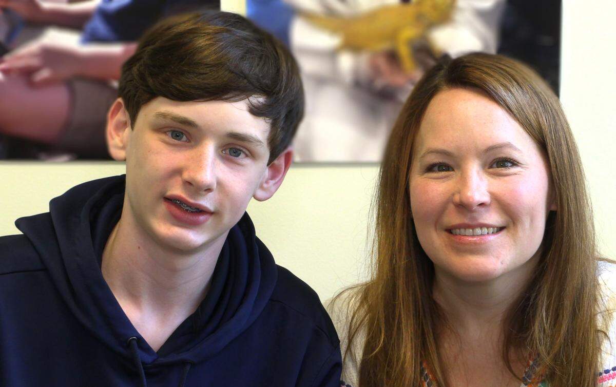 Collin Etheridge, left, and his mother Meghann Etheridge.