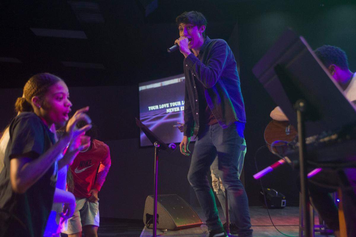 Teen worship services, like this one on June 9, 2021, and classes have resumed at North Highland Church as COVID-19 conditions improve, in Columbus, Ga.