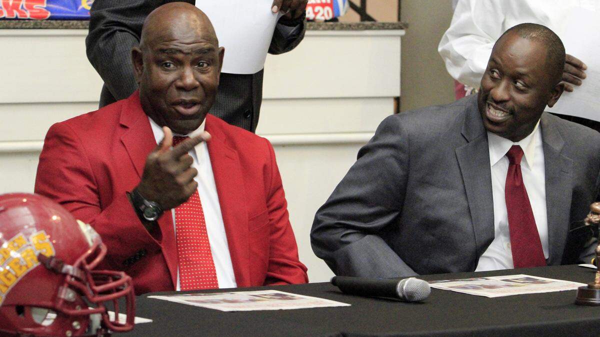 ROBIN TRIMARCHI/rtrimarchi@ledger-enquirer.comTuskegee University football coach Willie Slater, left, and Morehouse College football coach Rich Freeman talk before a news conference begins Wednesday at the Columbus Museum. The 80th Annual Tuskegee-Morehouse Classic will be played Saturday at A.J. McClung Memorial Stadium.