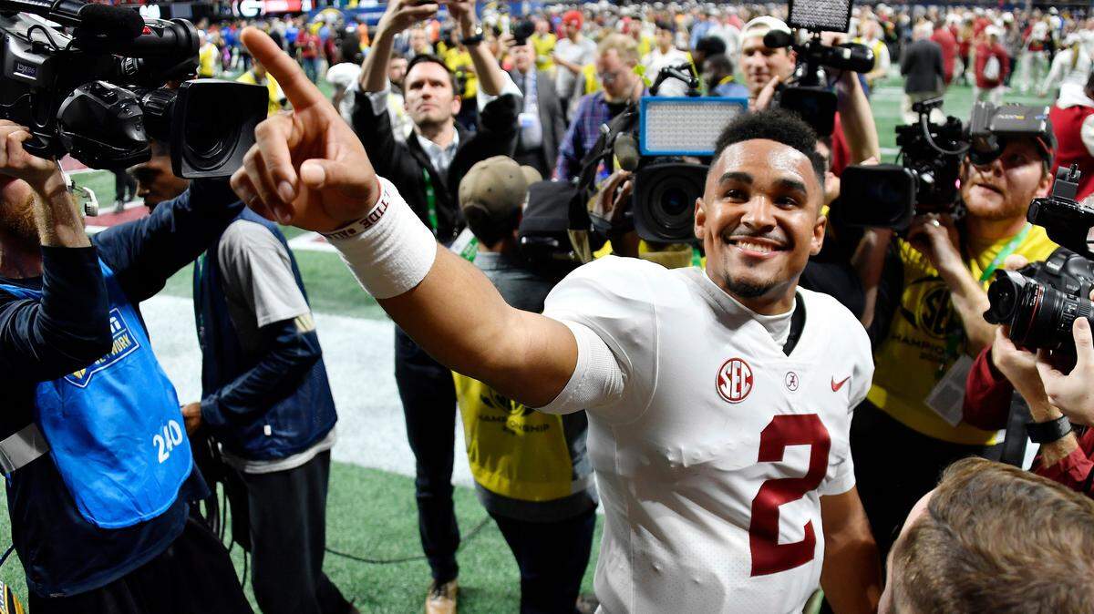 FILE - In this Saturday, Dec. 1, 2018 file photo, Alabama quarterback Jalen Hurts (2) speaks to fans after the Southeastern Conference championship NCAA college football game between Georgia and Alabama, in Atlanta. Alabama won 35-28. Even before Hurts came off the bench to lead Alabama’s comeback win over Georgia in the Southeastern Conference championship game, his popularity has only seemed to grow since his role shrank. (AP Photo/John Amis, File)