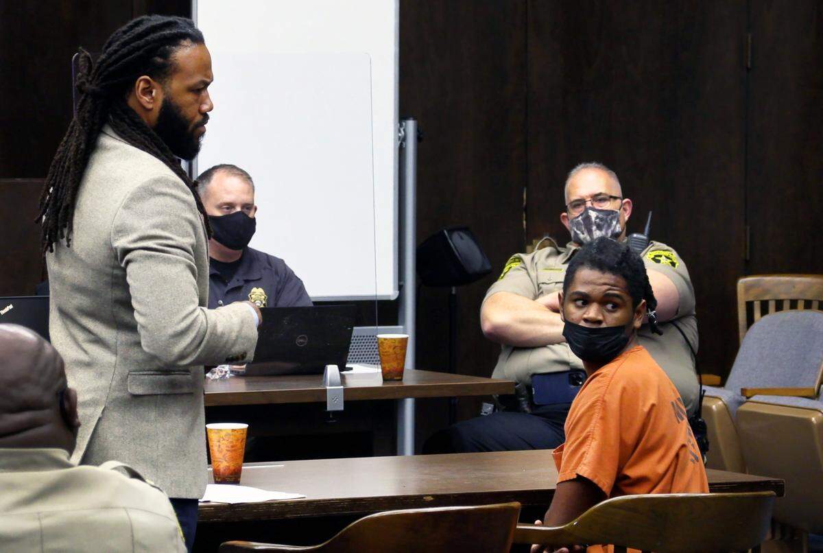 A Columbus jury found Rayshondre Gartrell Tarver, seated right, not guilty of murder in the fatal shootings of two men he claimed set him up for robbery during a marijuana deal, but he will still serve prison time on other charges related to the incident.