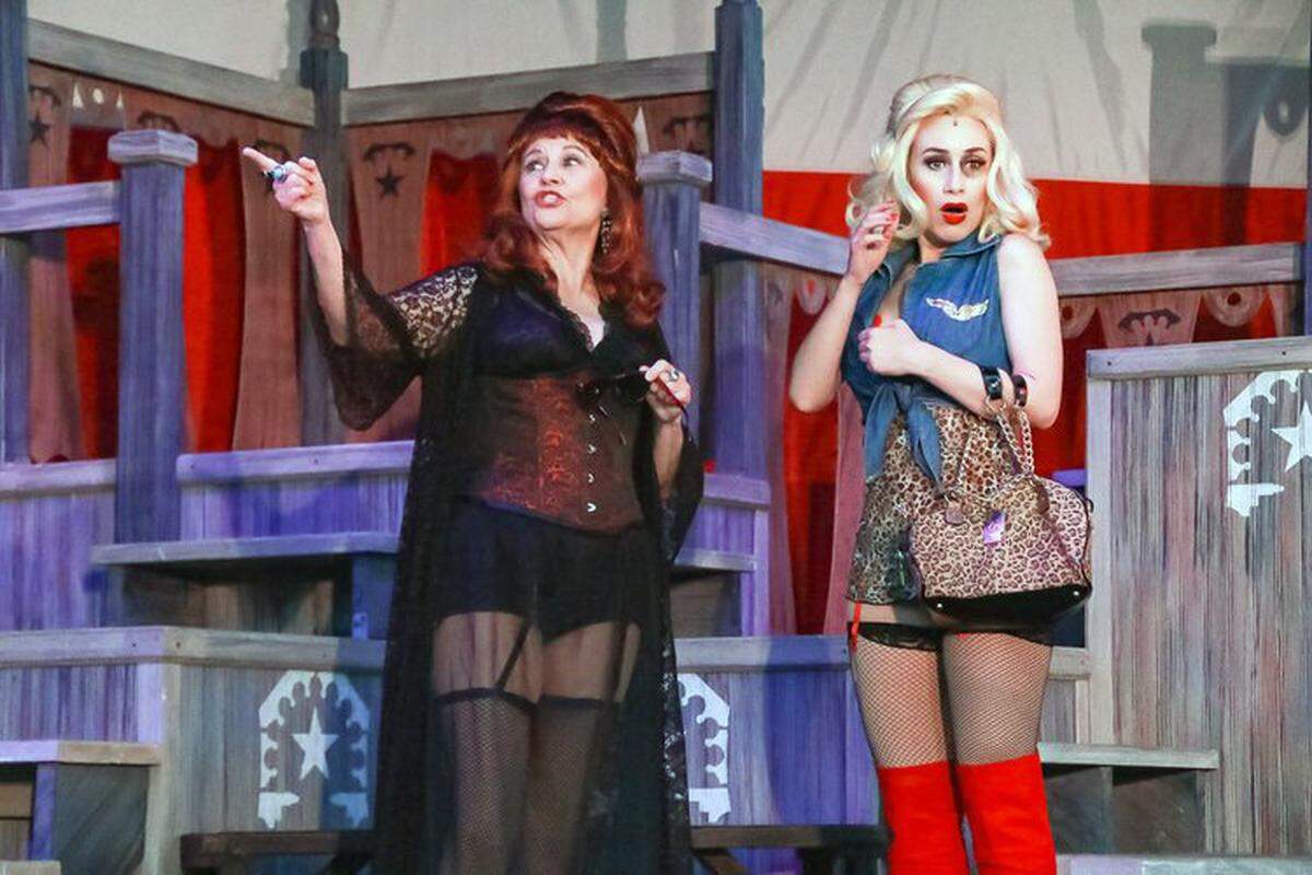 Debbie Anderson and Larren Woodard perform in a Springer Opera House production of “Best Little Whorehouse in Texas.”