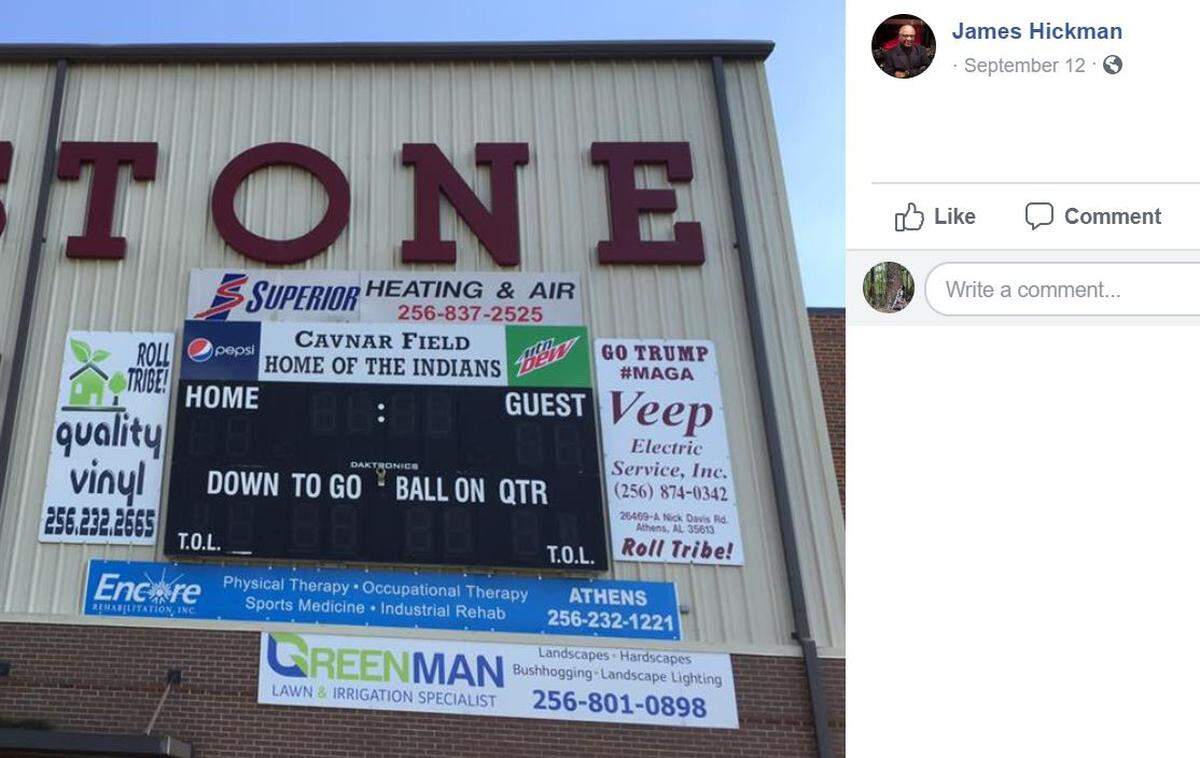 A sign next to a high school scoreboard that says “Go Trump #MAGA” can stay, an Alabama school district said recently. 