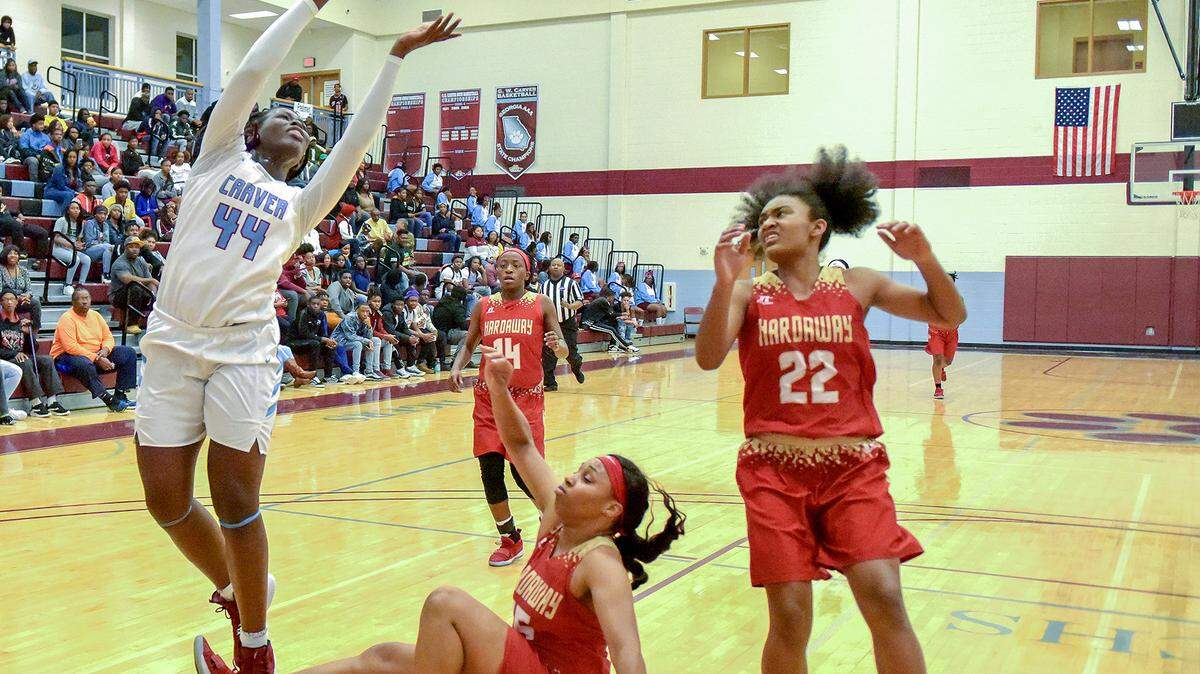 Carver’s Olivia Cochran shoots during the Lady Tigers’ game against Hardaway at the Region 1-AAAA girls’ and boys’ tournament Feb. 8 at Carver High School in Columbus.