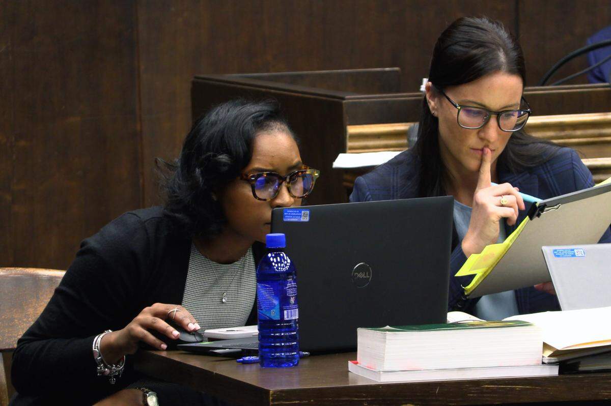 The state attorney general’s gang prosecution team includes analyst Jada Matthews, left, and prosecutors Cara Convery, right, and T. McKenzie Gray, not pictured. 10/31/2023