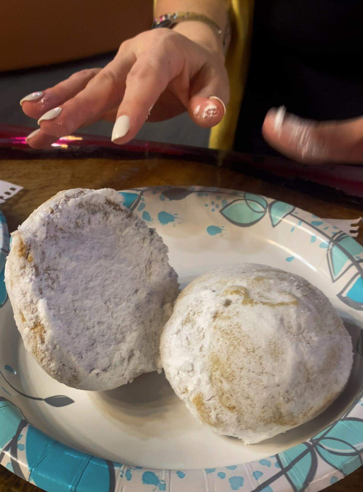 Besos, two pieces of sweet bread sealed with a layer of pastry cream and covered with sugar, are among the sweet treats at Chilango Pride Bakery in Columbus. 04/24/2025