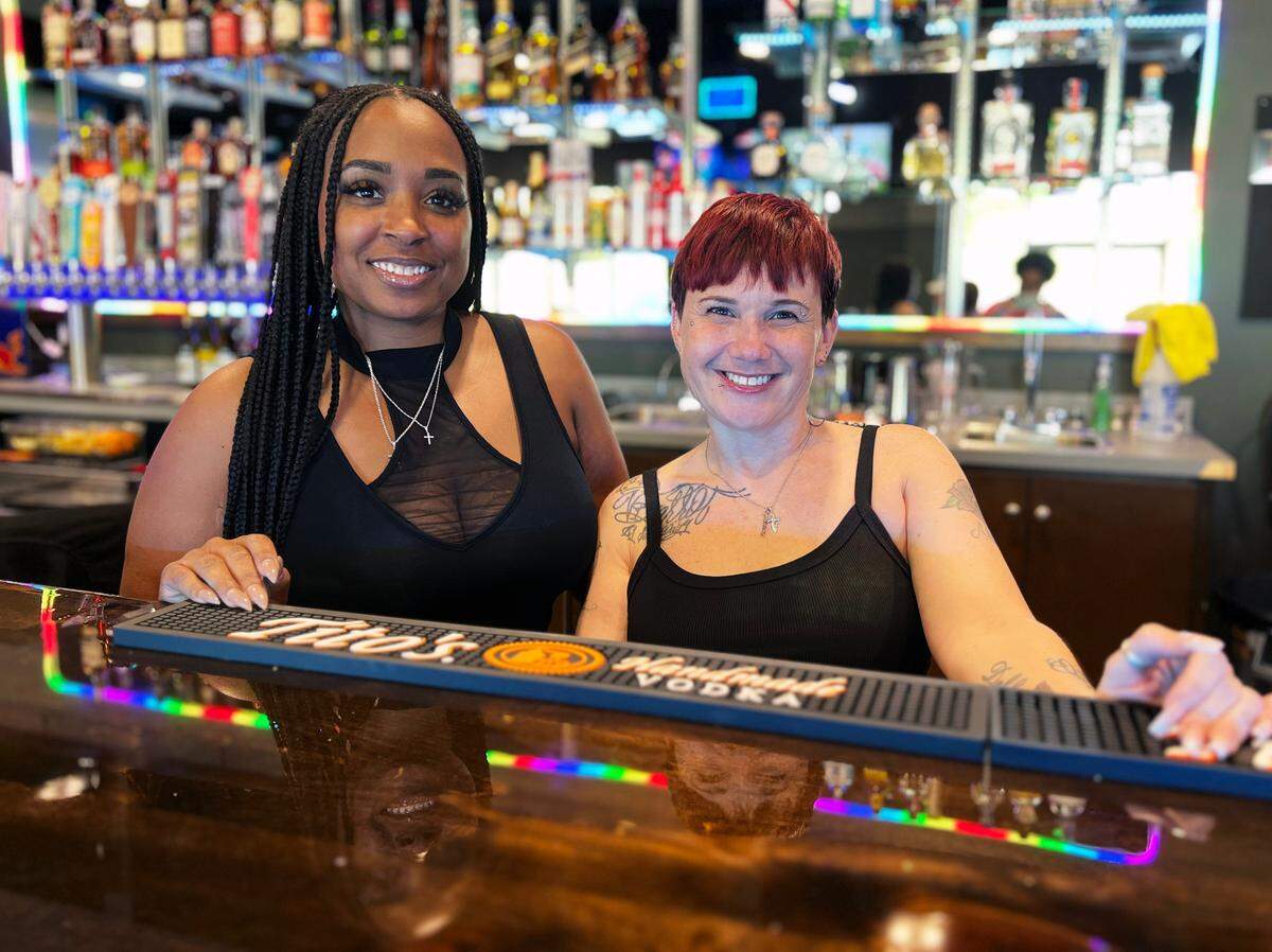 Domonique, left, is a bartender, and Kim, right, is a server at the Tipsy Bar & Grill is located at 1780 Williams Rd. in Columbus, Georgia. 09/04/2024