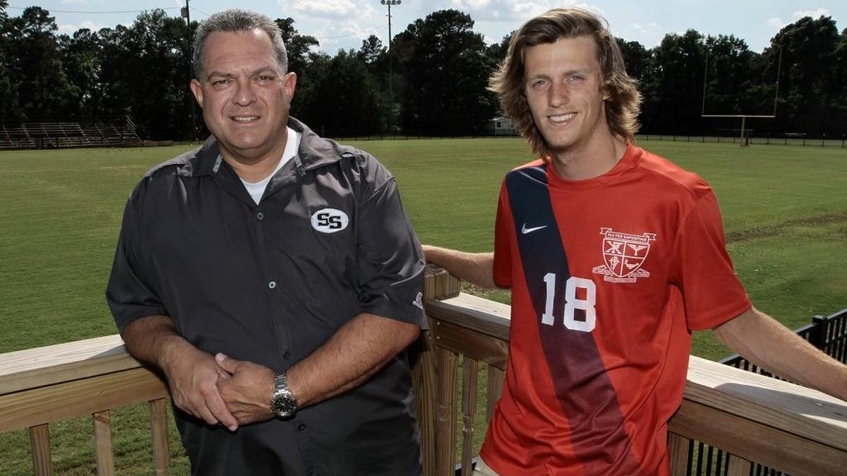 All-Bi-City Boys Soccer Coach of the Year Jeff Carrero of Smtihs Station, left, and Player of the Year TJ Fick of Pacelli.