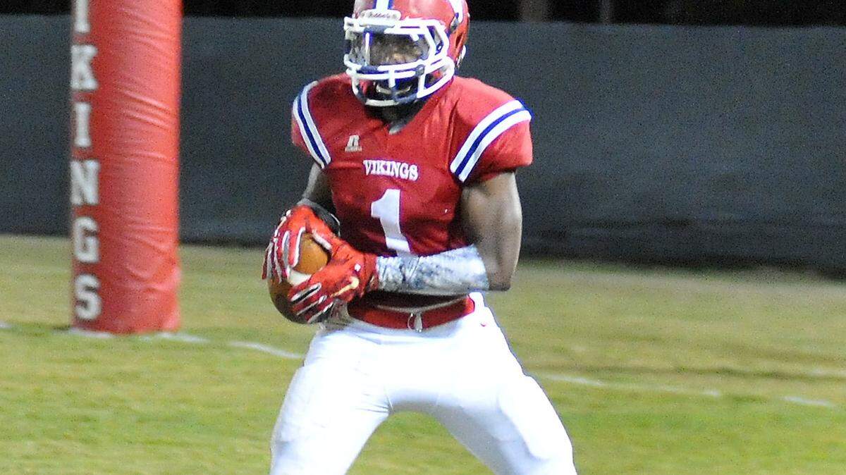 Pacelli's wide receiver Renault Green is all alone at the one yard line as he comes down with the pass reception from quarterback Tre`Vionne Sudberry and carries into the end zone for Pacelli's first touchdown of the game against Greenville Friday night