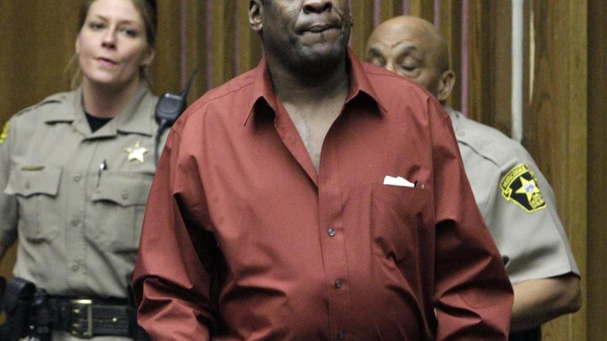 Jerry Wayne "Scarface" Merritt is escorted into Superior Court as his trial continues in the June, 6, 2014 death of Anthony Wayne "Red" Taylor.